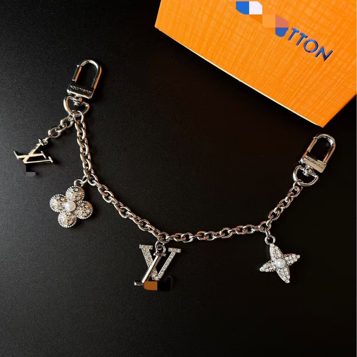 LV bag charm