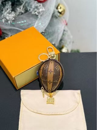 LV bag charm