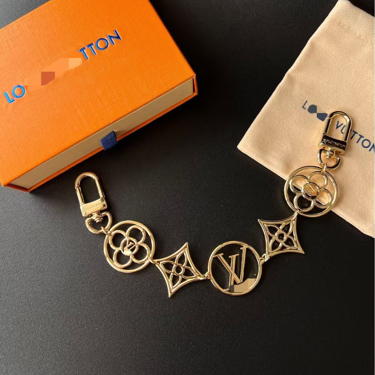 LV bag charm