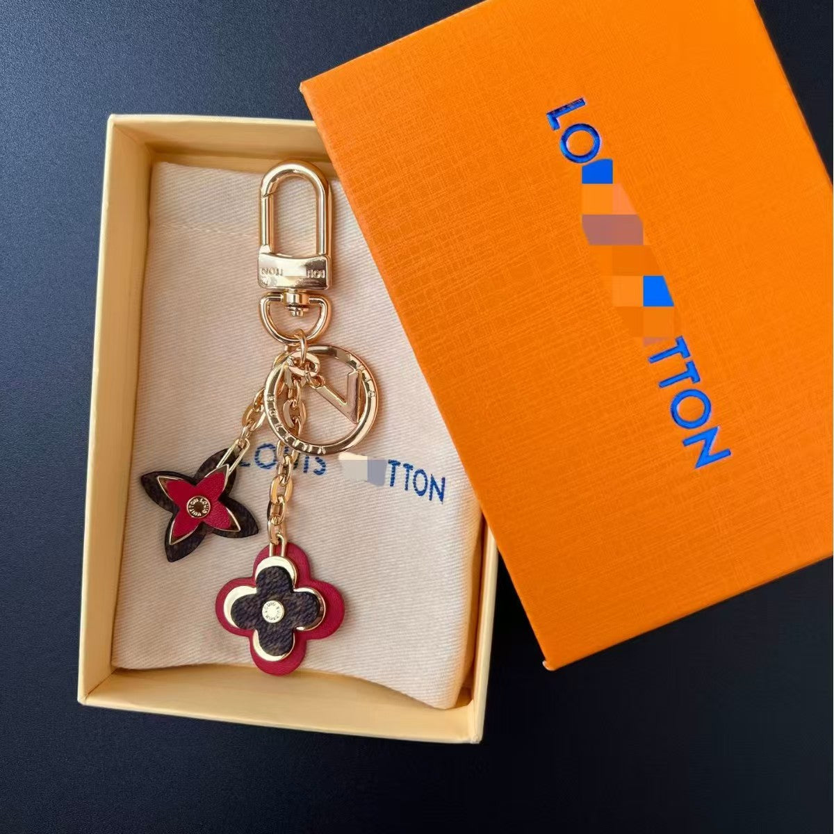 LV bag charm