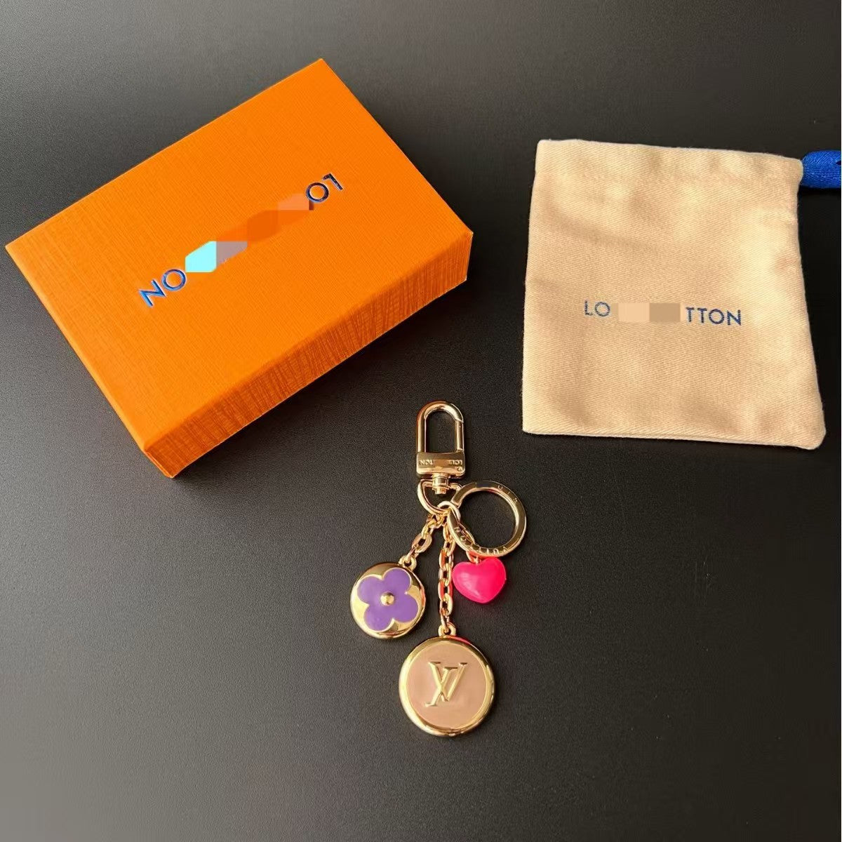 LV bag charm