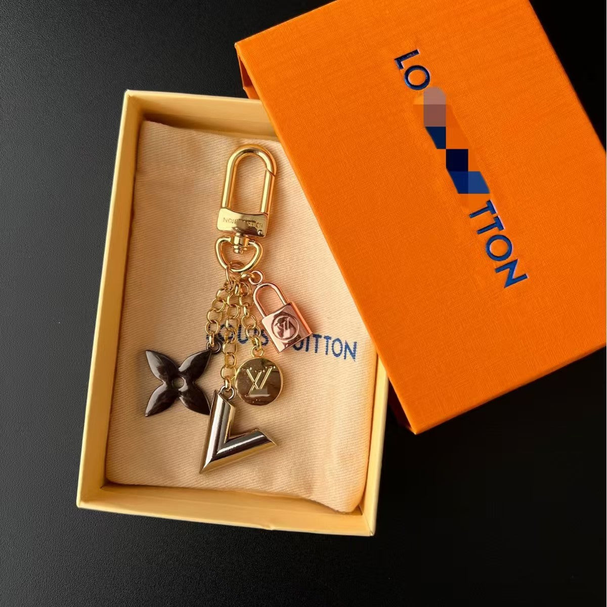 LV bag charm