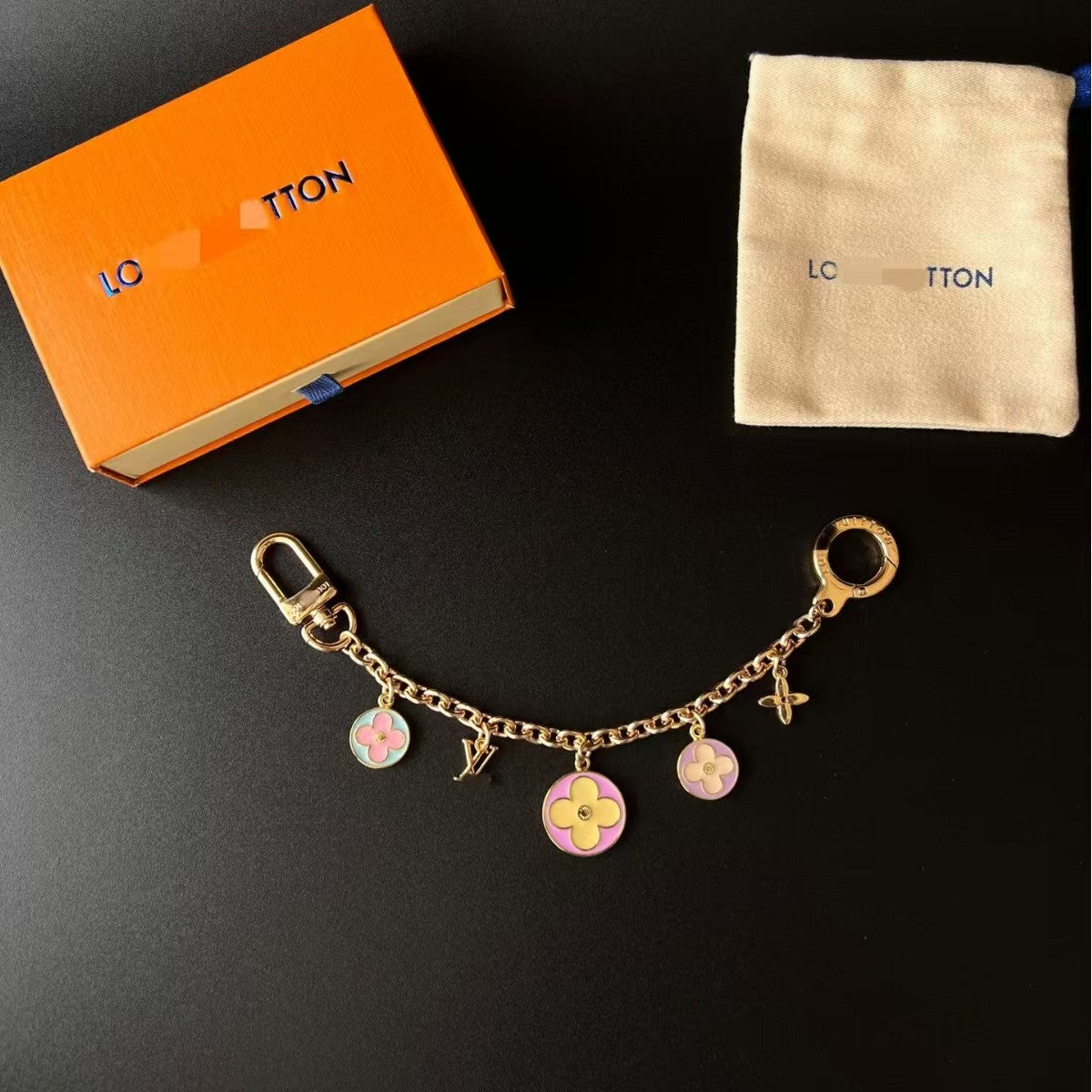 LV bag charm