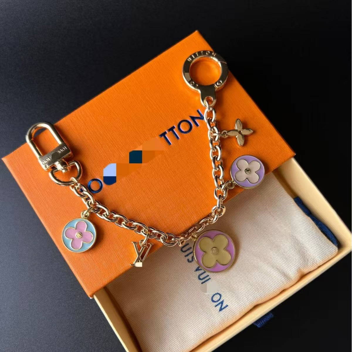 LV bag charm