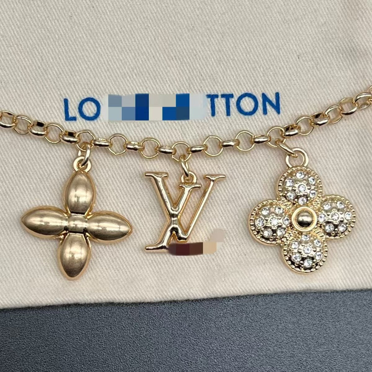 LV bag charm