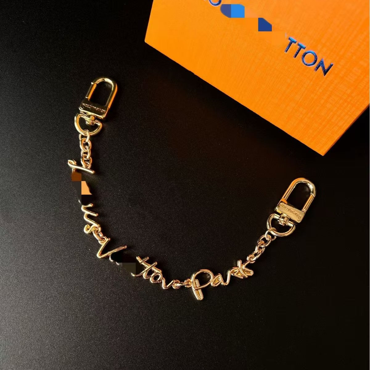 LV bag charm