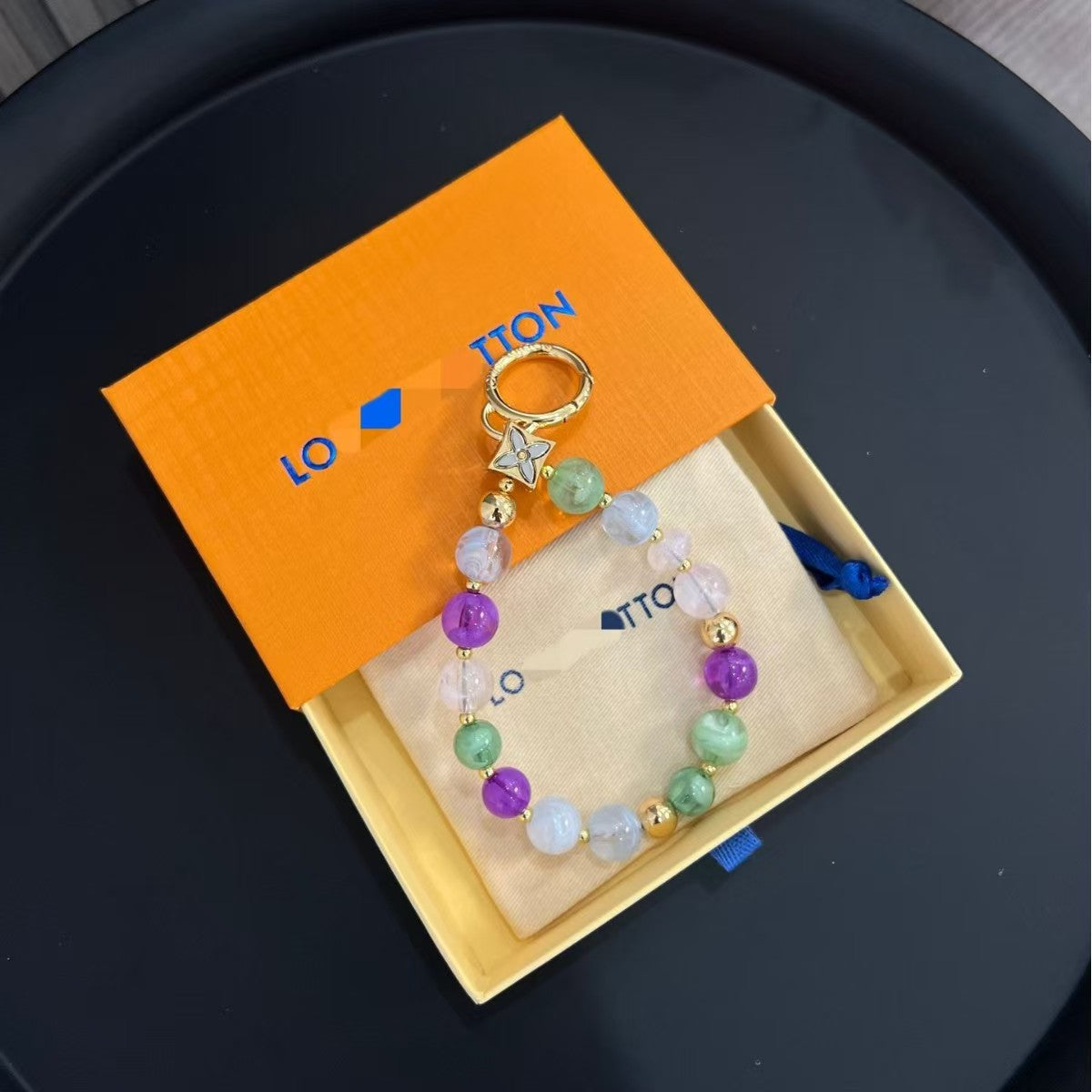 LV  bag charm