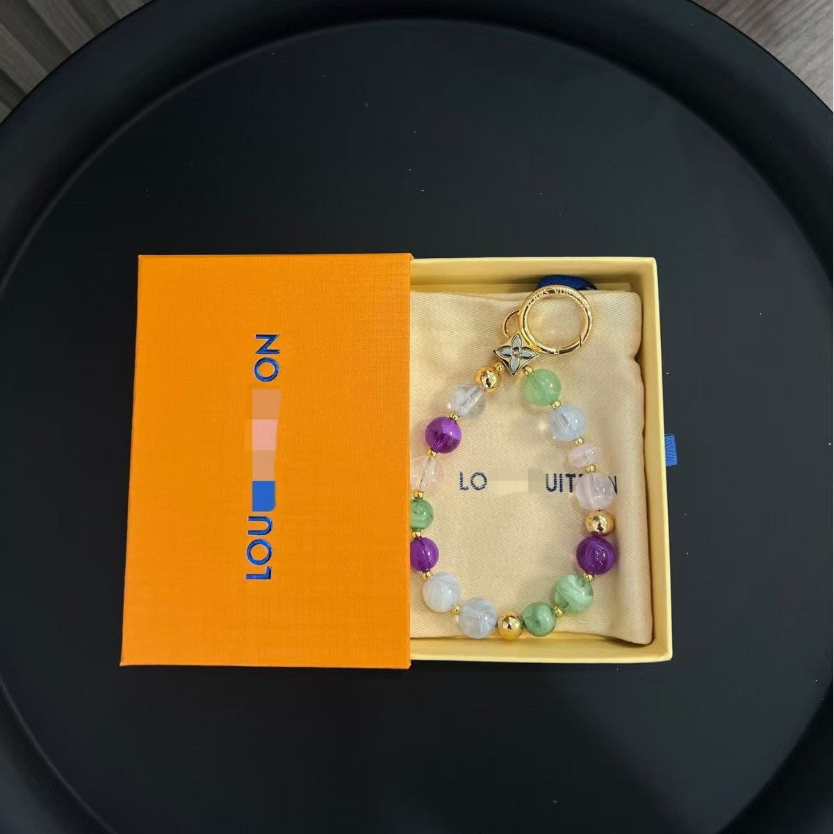 LV  bag charm