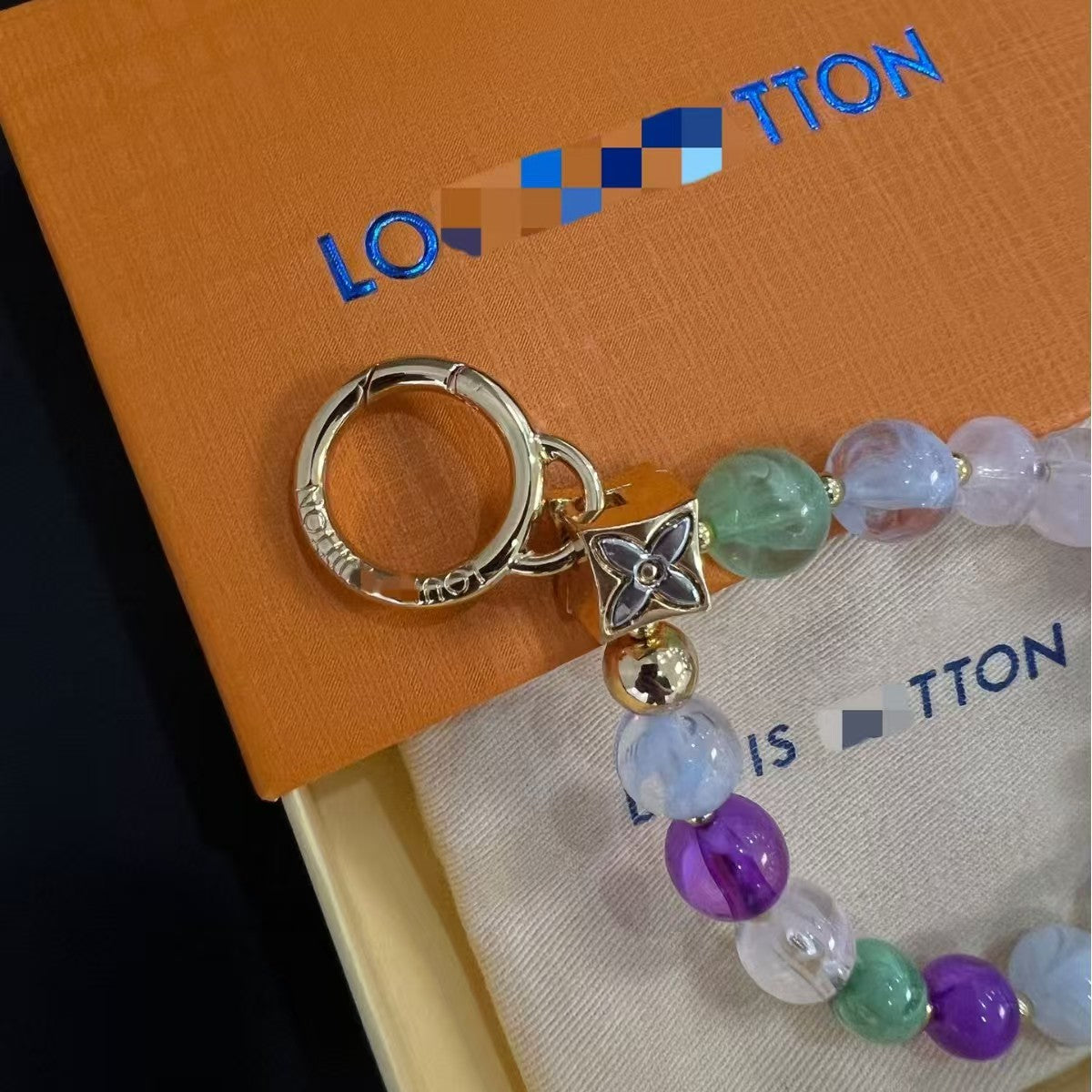 LV  bag charm