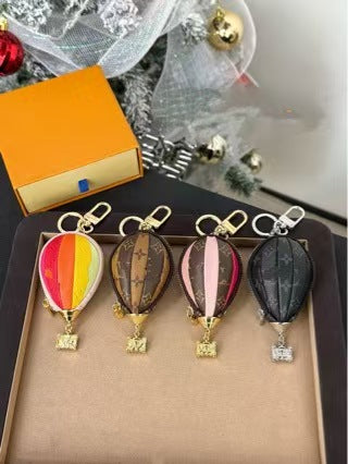 LV bag charm