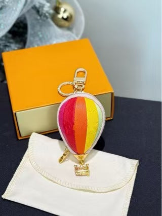 LV bag charm