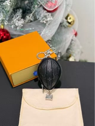 LV bag charm